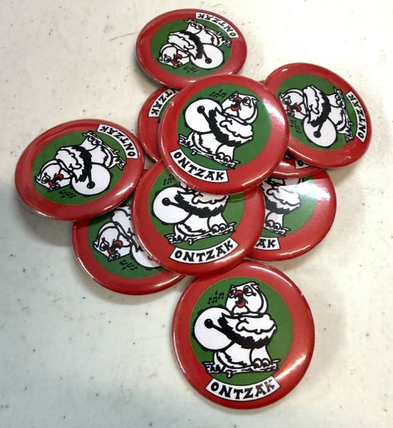 Chapas con el dibujo del cliente